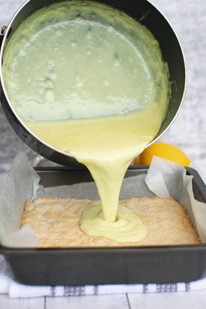 custard poured on top of crust in baking pan