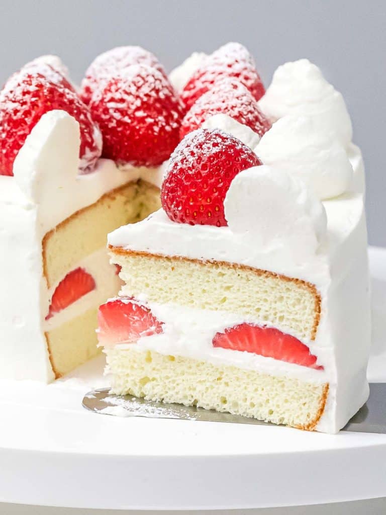 Japanese strawberry shortcake with whipped cream frosting and fresh strawberries