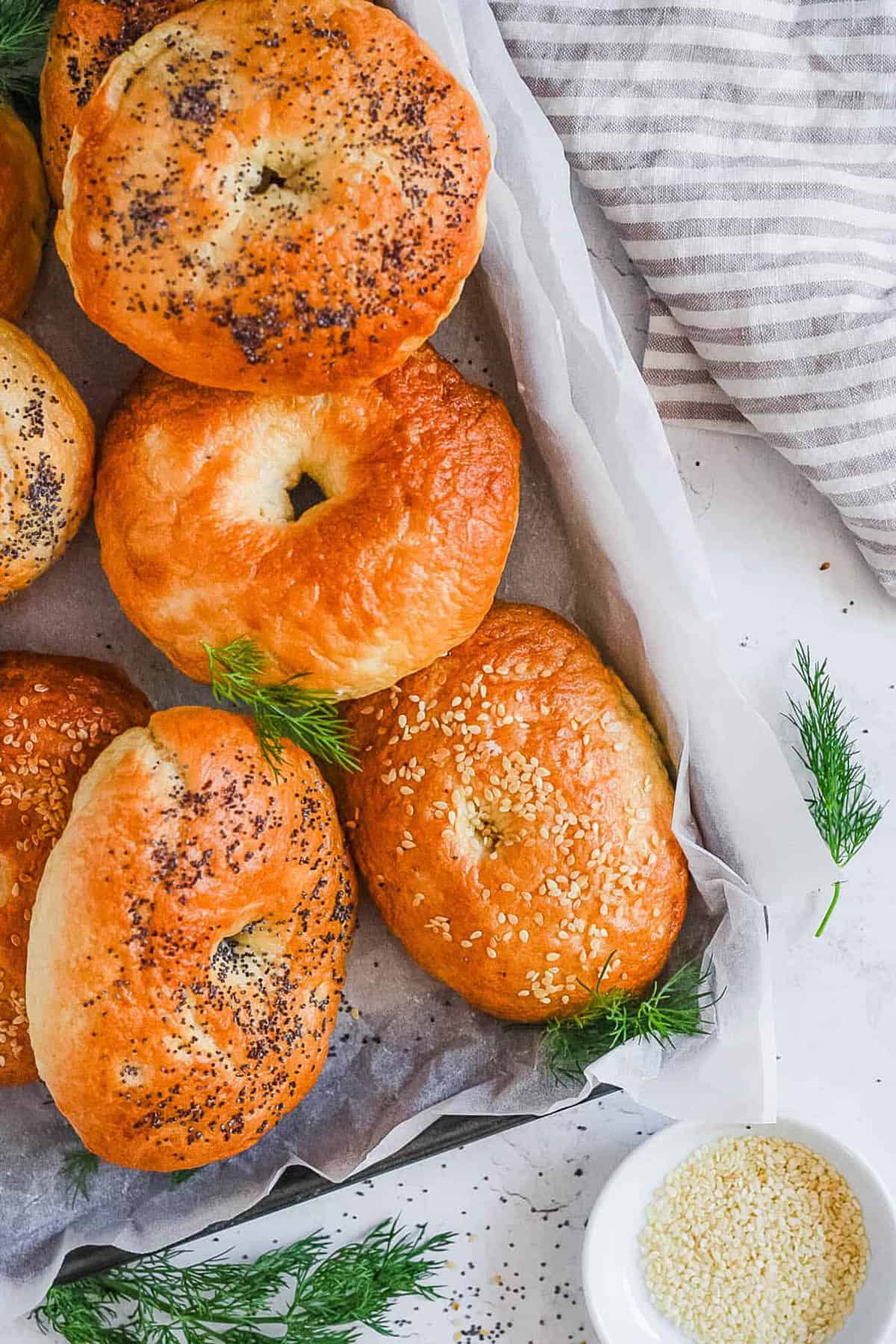 Vegan bagels served on a white tray.