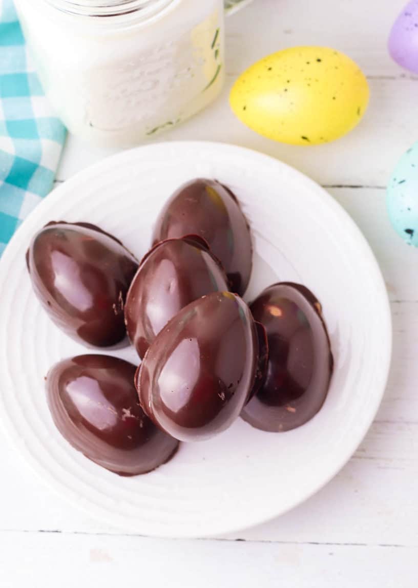 homemade peanut butter eggs on a white plate - reese's egg makeover