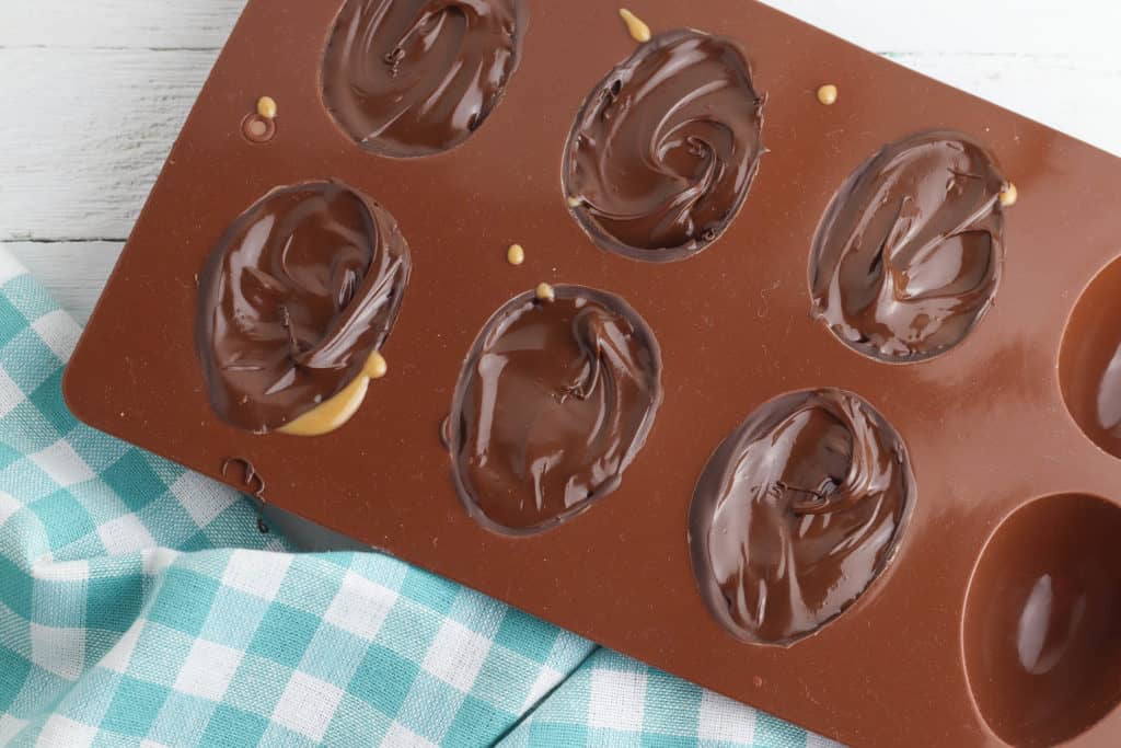 chocolate and nut butter in silicone molds