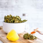 Garlic Parmesan Oven Baked Kale Chip Recipe in a white bowl