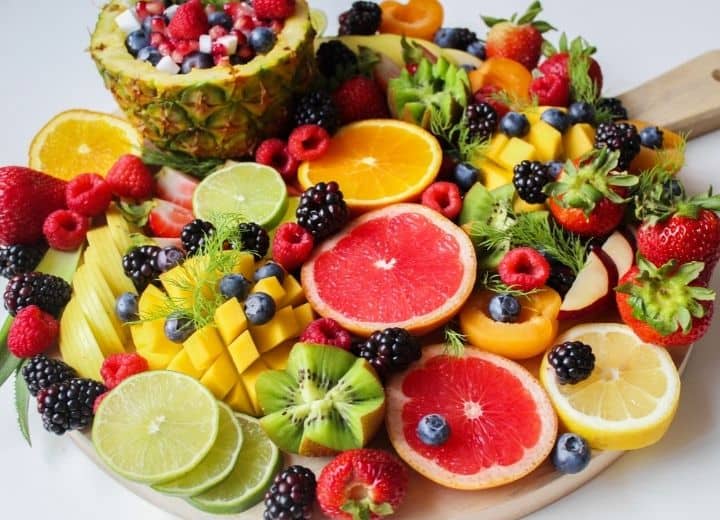 fruit tray with citrus fruits, berries, and more 