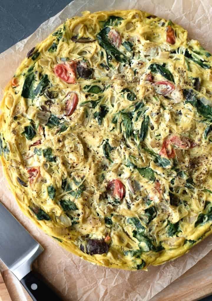 pasta frittata on brown parchment paper