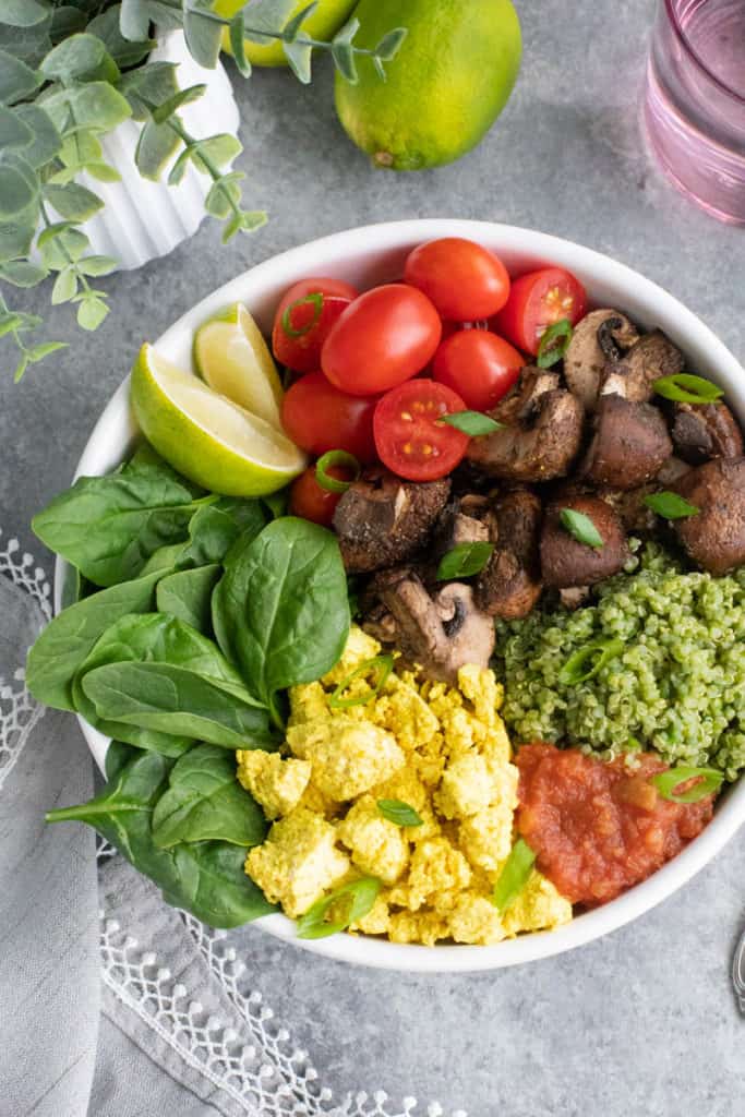 vegan breakfas bowl with spinach, tofu, salsa, mushrooms, and tomatoes - high protein vegan breakfast