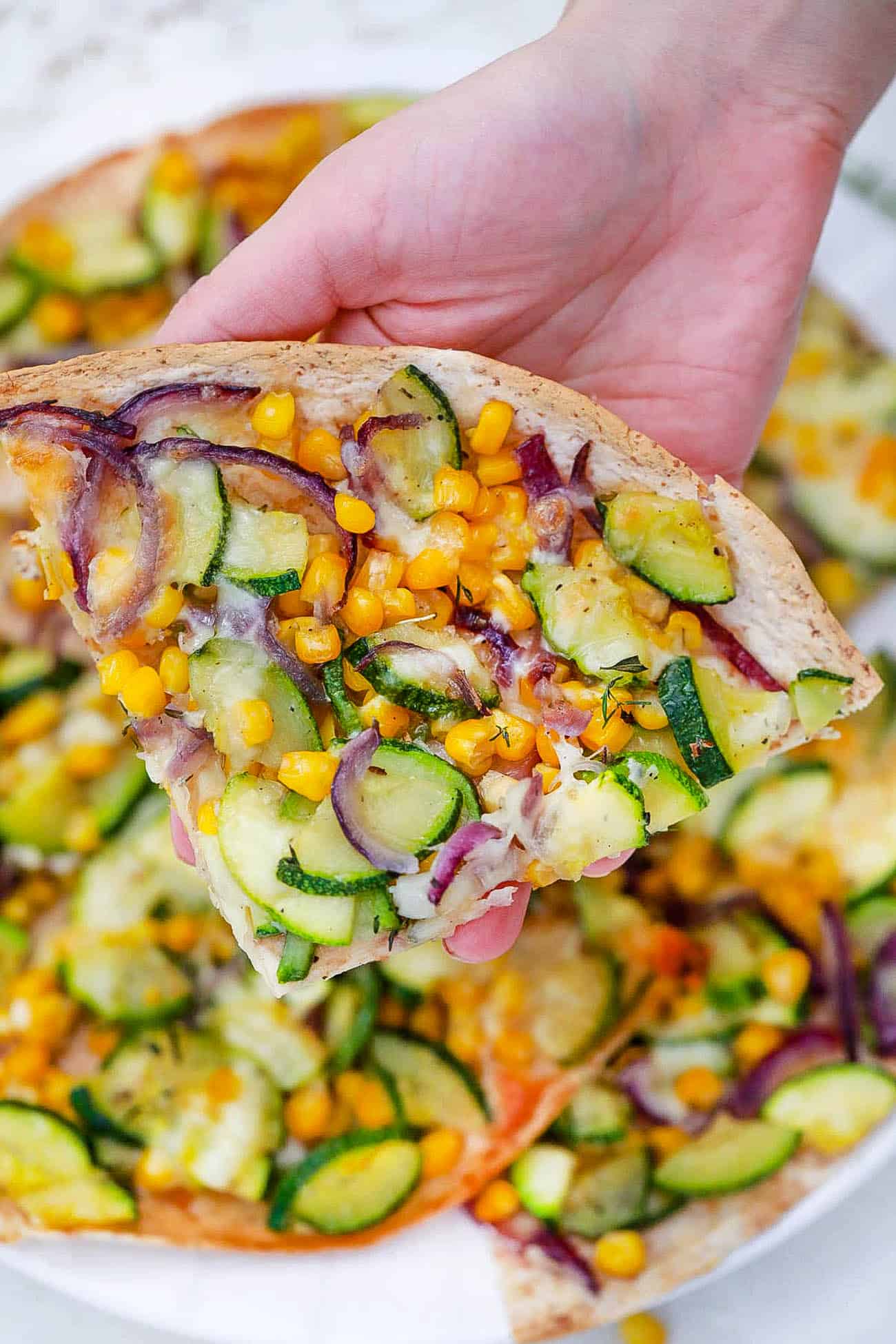 slice of zucchini flatbread - corn flatbread