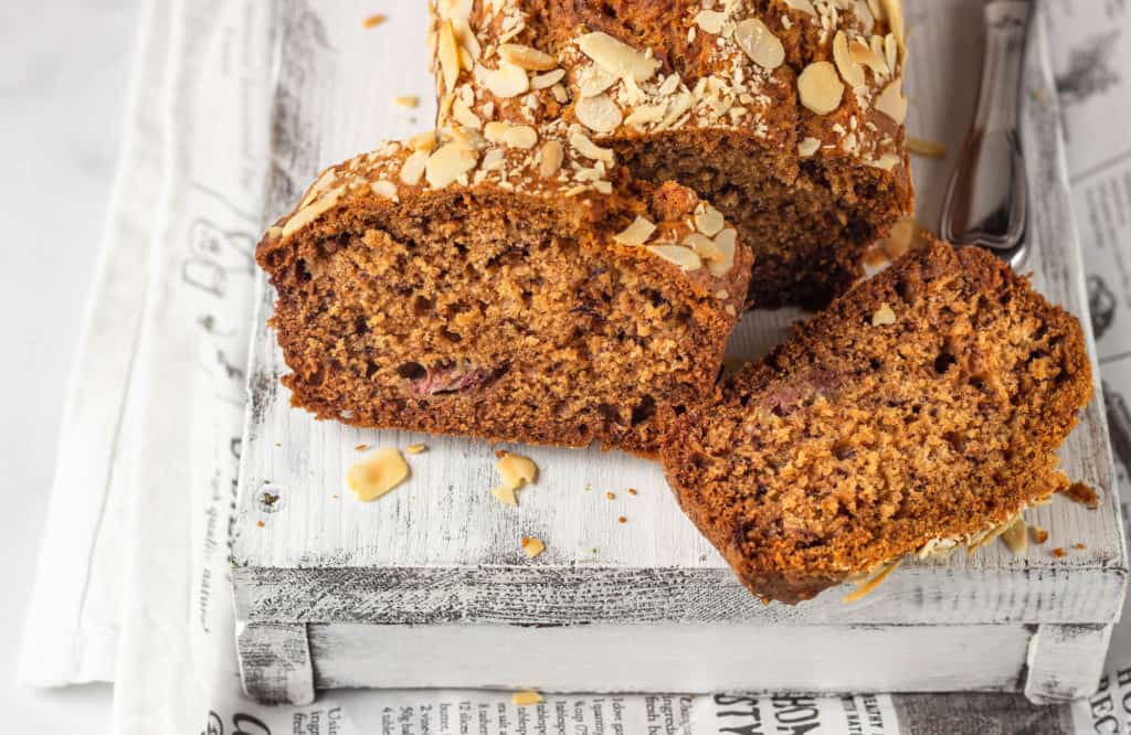 vegan banana bread recipe without butter served on a grey cutting board