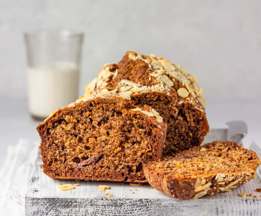 vegan banana bread recipe without butter served on a grey cutting board