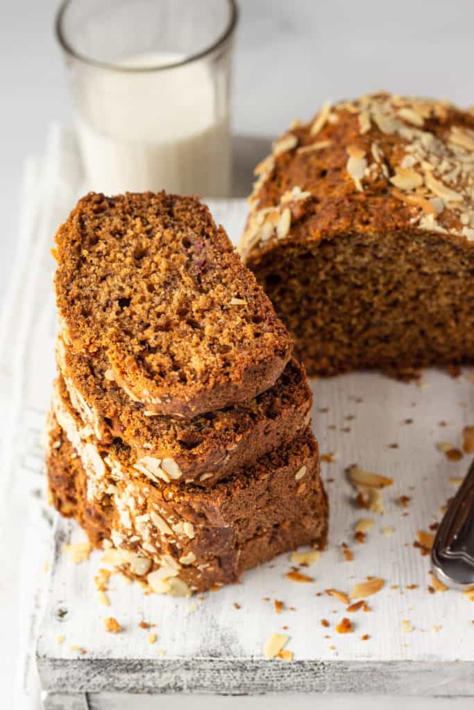 vegan banana bread recipe without butter served on a grey cutting board