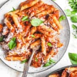 red lentil pasta served on a white plate with superfood marinara sauce