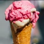 hand ،lding ice cream cone