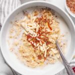 Spicy Oatmeal Recipe (Masala Oats) with saffron in a white bowl