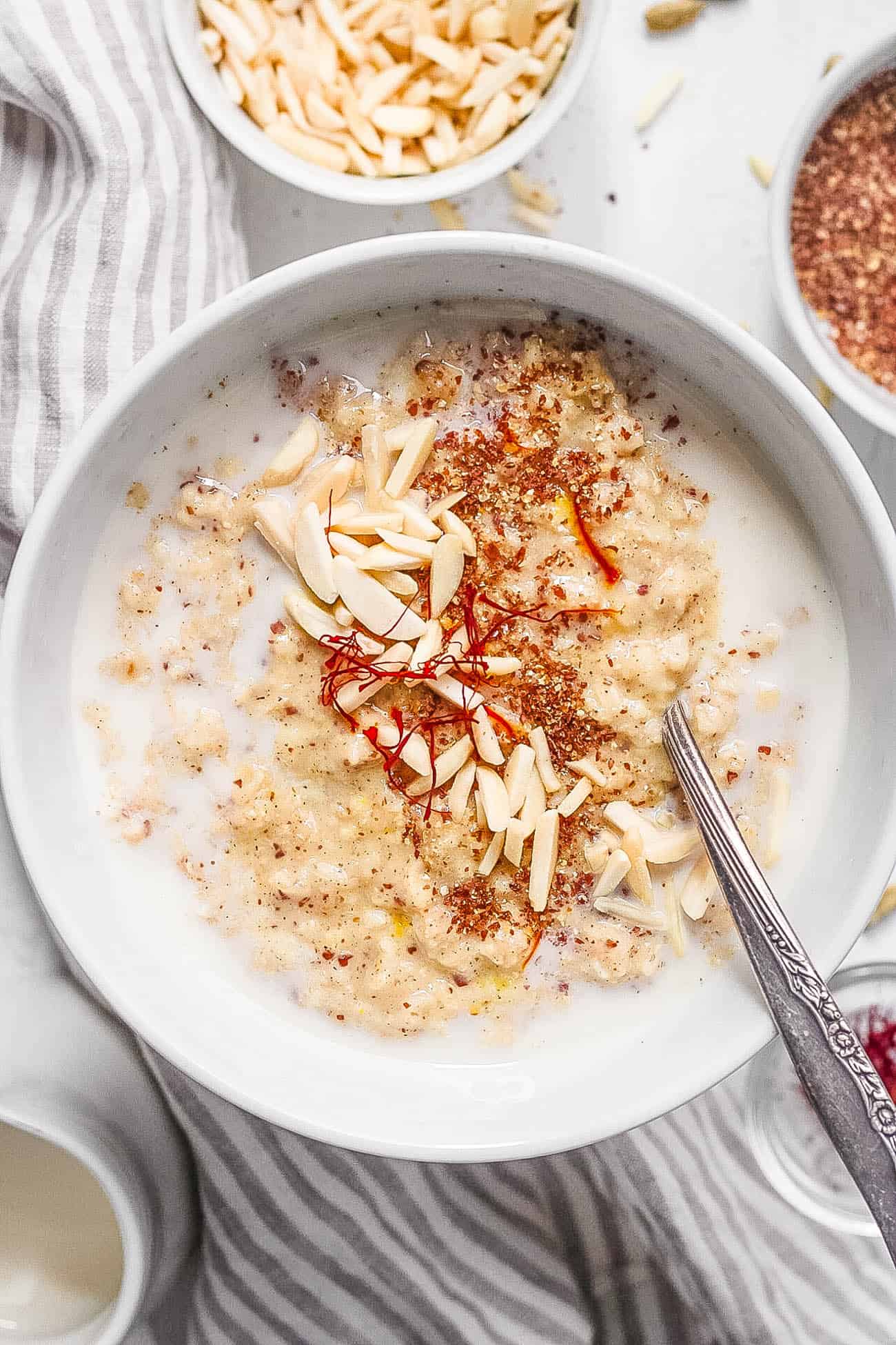 Spicy Oatmeal Recipe (Masala Oats) with saffron in a white bowl