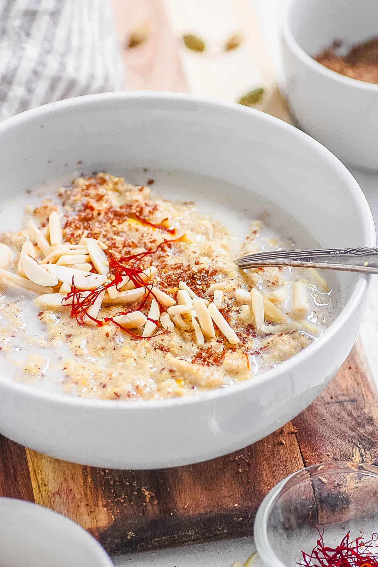 Spicy Oatmeal Recipe (Masala Oats) with saffron in a white bowl