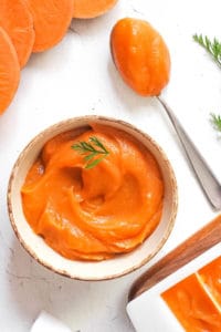 sweet potato baby food in a white bowl