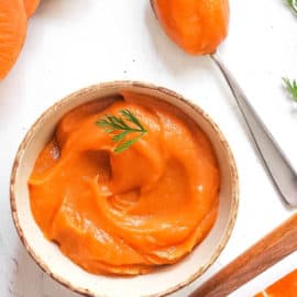 sweet potato baby food in a white bowl