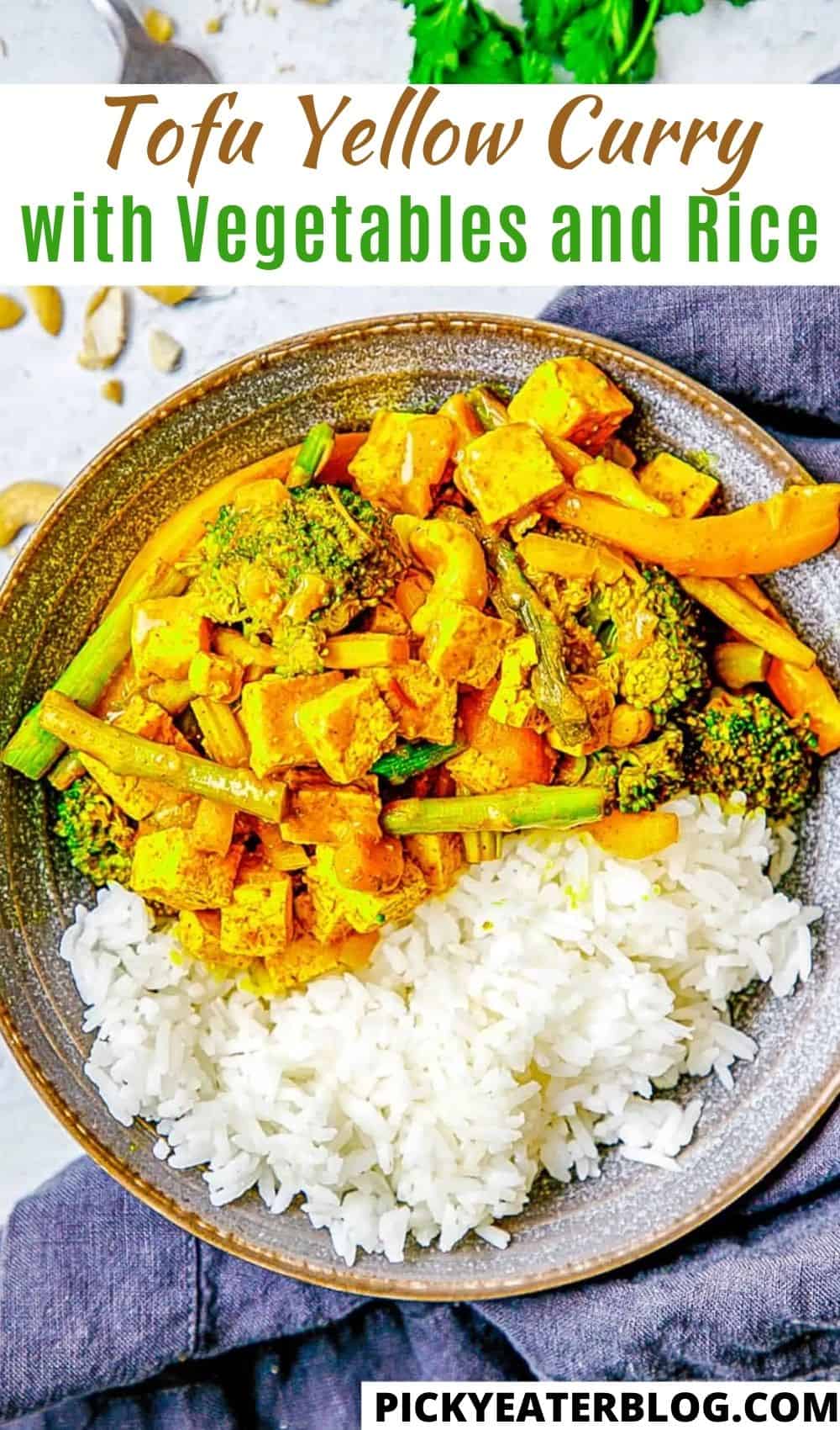 tofu curry in bowl served with rice