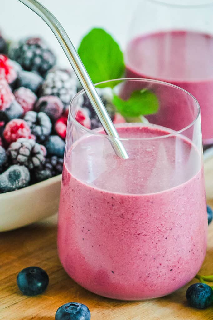 berry smoothie in a glass with a metal straw - baby dinner recipes