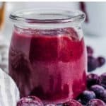 Blueberry puree in glass jar.
