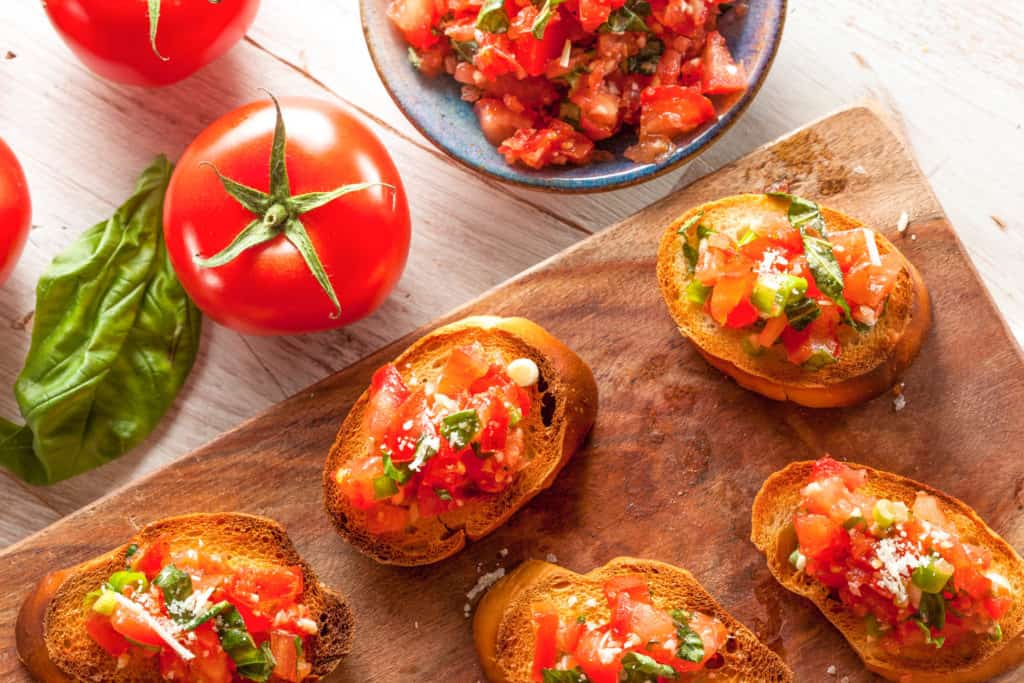 Homemade Italian Bruschetta Appetizer with Basil and Tomatoes