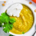 lentil puree with yogurt and cilantro in white bowl