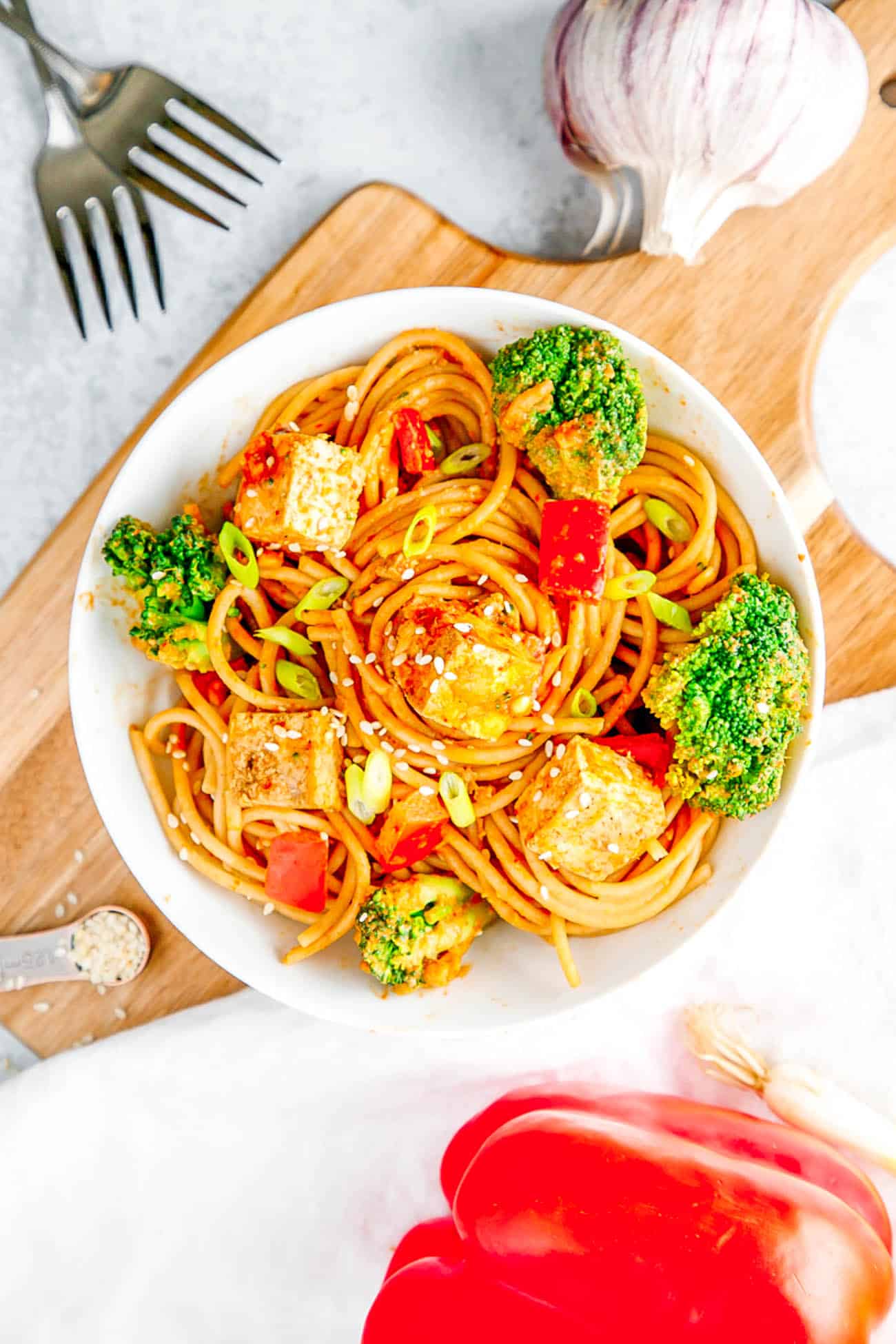 peanut sauce for noodles - thai noodles with broccoli tofu and peanut sauce in a white bowl