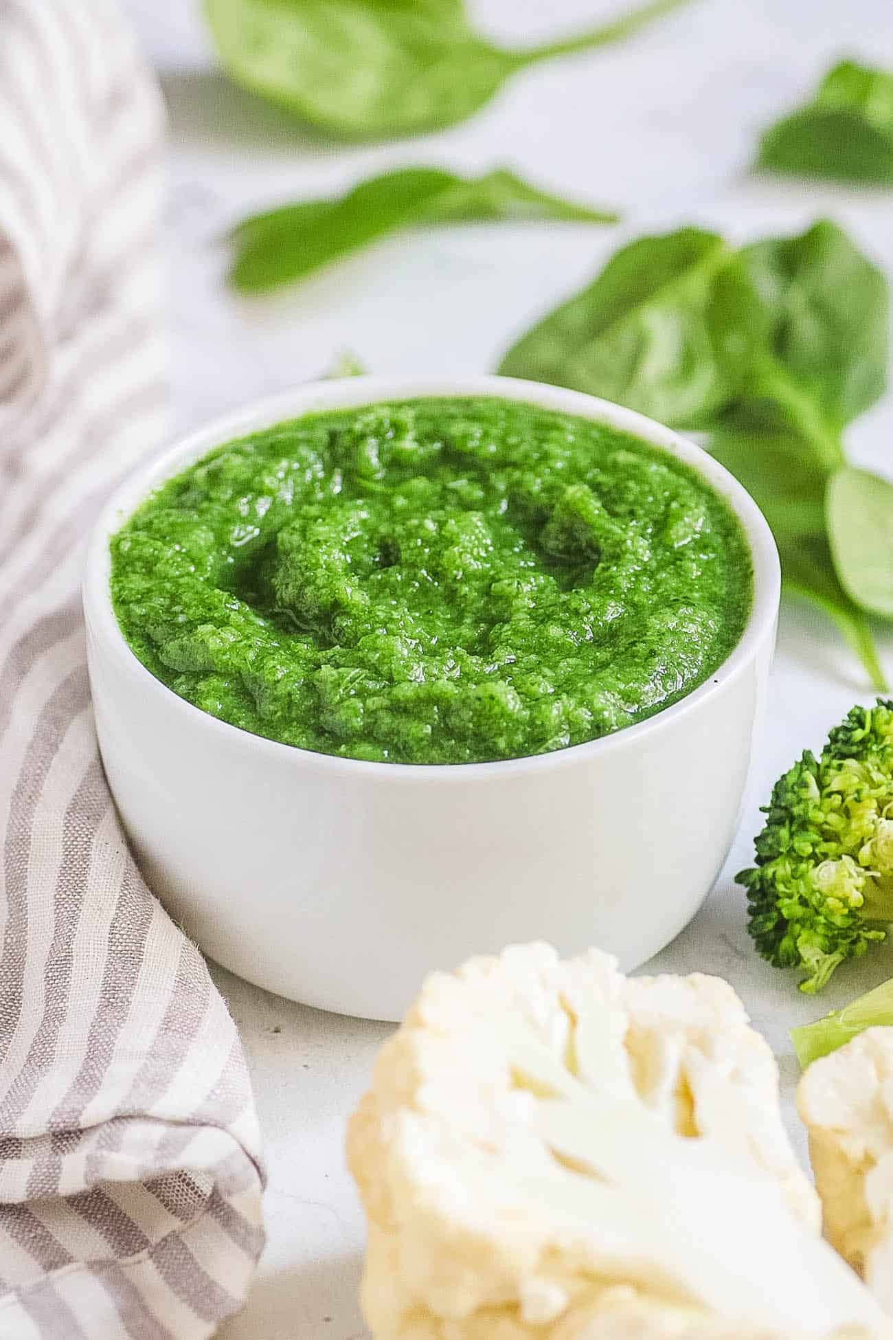 Vegetable Puree for Baby: Broccoli, Spinach, Cauliflower in a white bowl