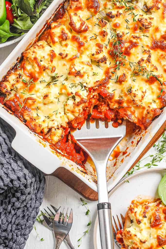 finished vegetarian zucchini lasagna in a white baking dish