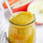 zucchini puree in baby jar with spoon