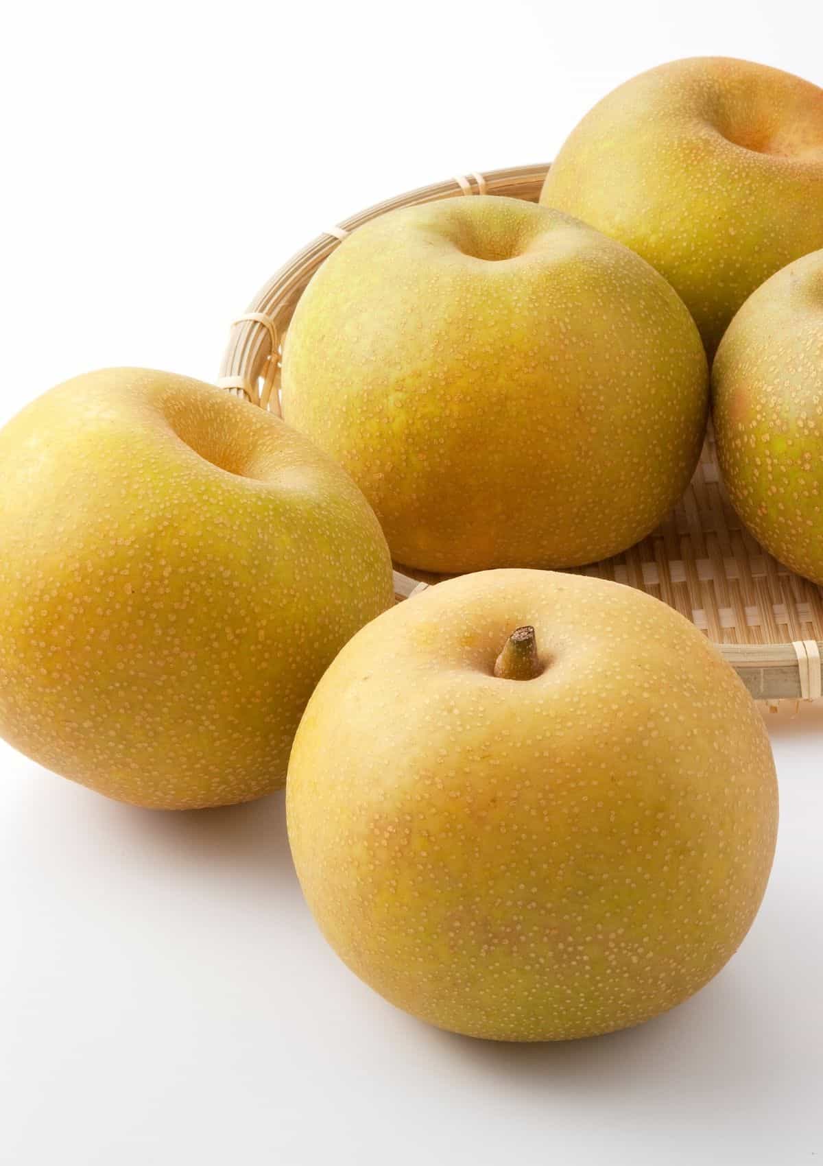 Nashi pears in basket.