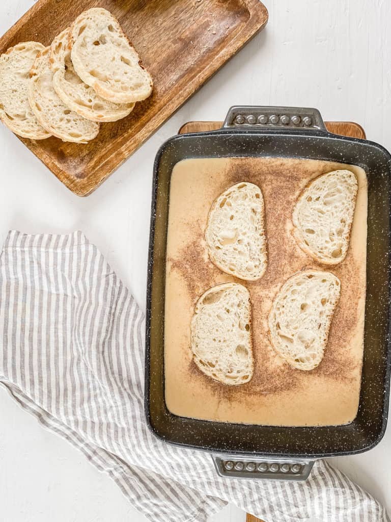 bread slices being dipped into egg mixture