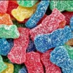 sour patch kids candies in a pile