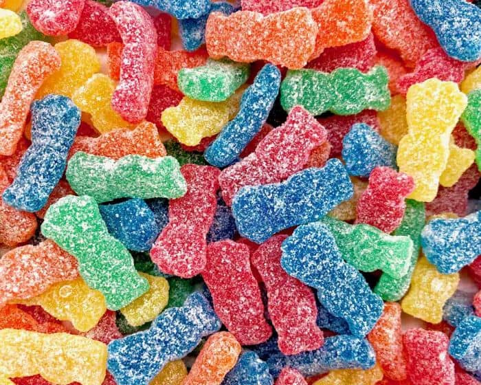 sour patch kids candies in a pile