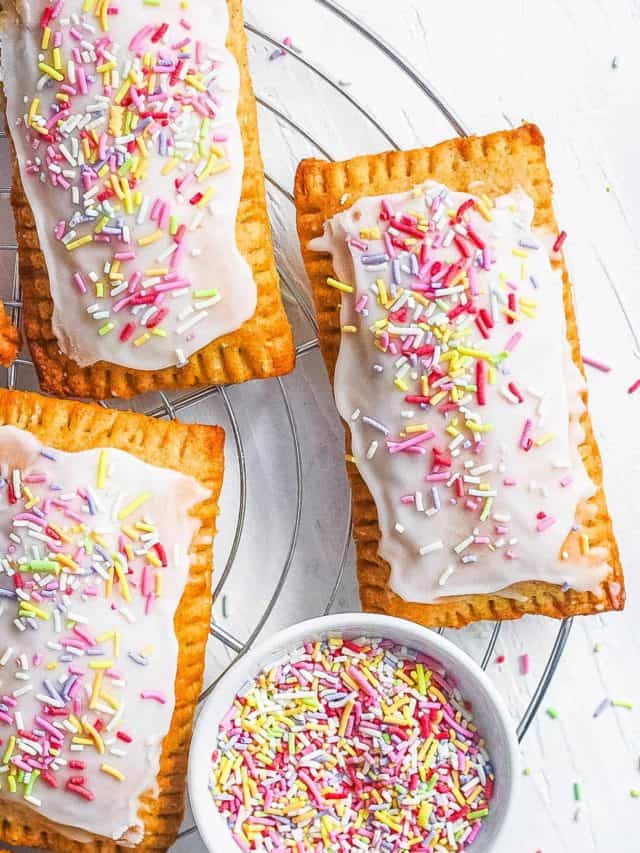 Strawberry vegan pop tarts on a wire cooling rack.