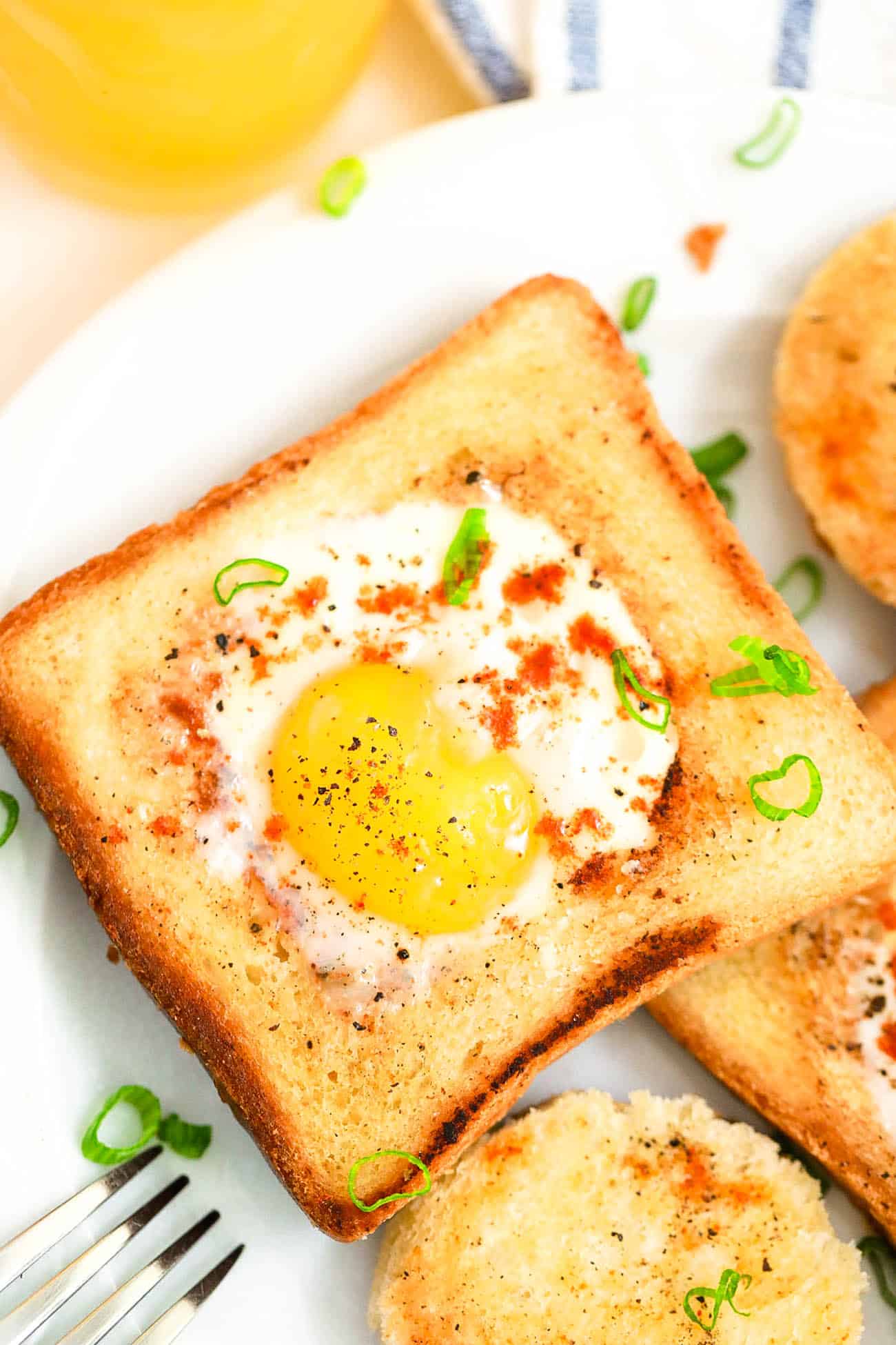 eggs in a basket - a classic breakfast served on a white plate
