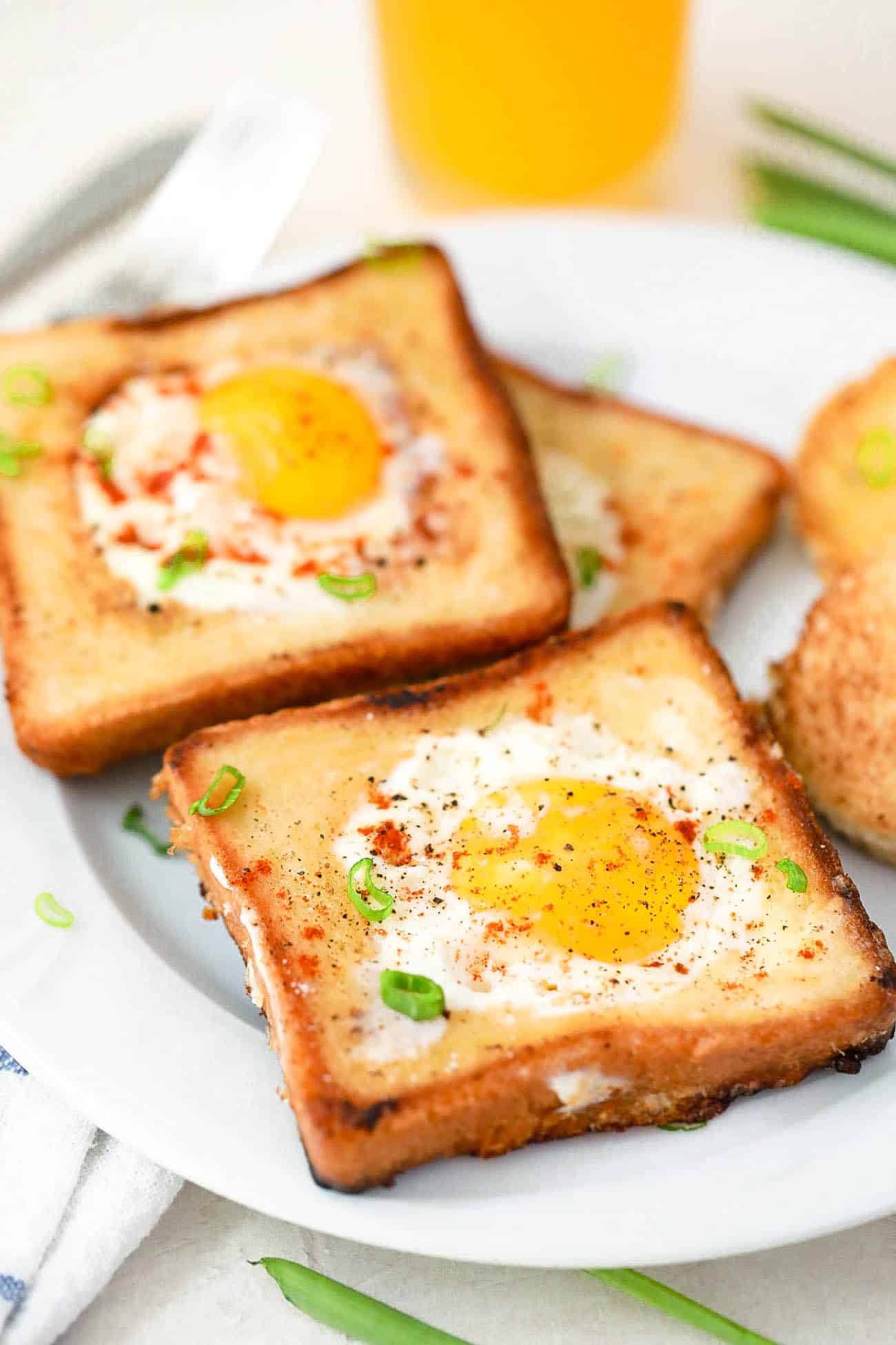 eggs in a basket - a classic vegetarian breakfast served on a white plate