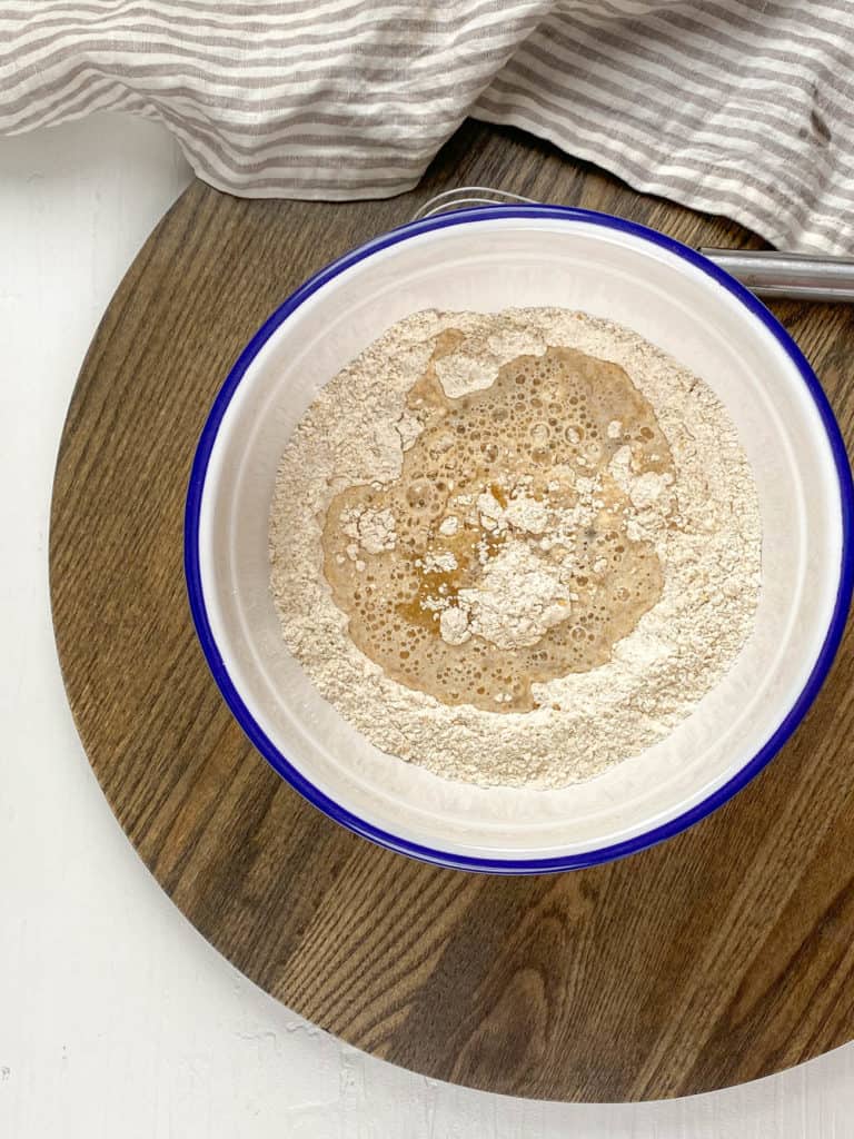 A bowl of flour and water before being mixed together.