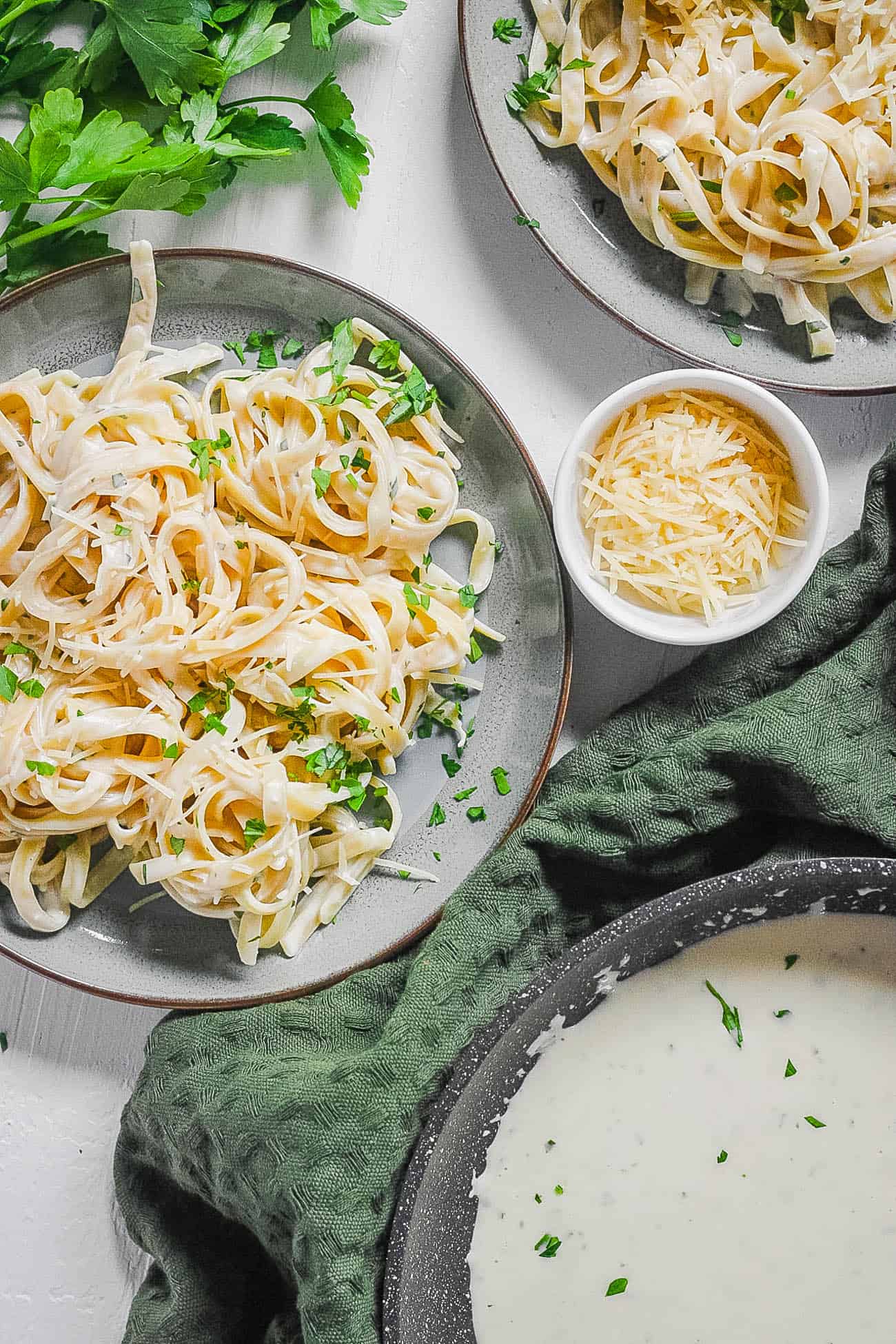 alfredo sauce without heavy cream tossed with fettuccine in a bowl