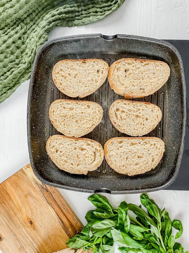 bread toasting on a grill pan