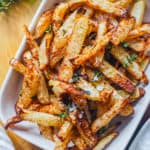 vegan easy air fryer jicama fries in a white serving dish