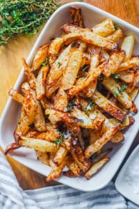 vegan easy air fryer jicama fries in a white serving dish