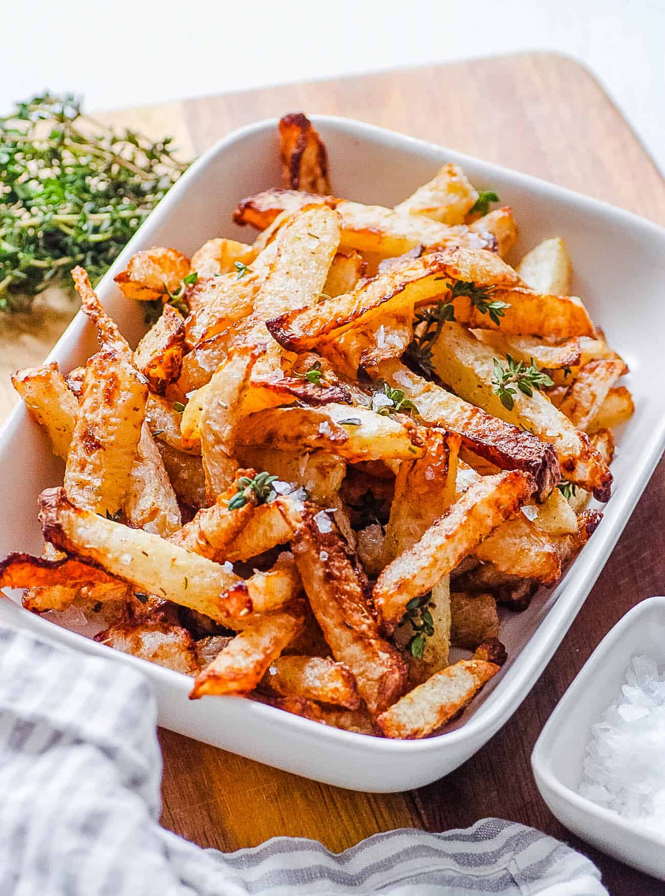 healthy easy air fryer jicama fries in a white serving dish