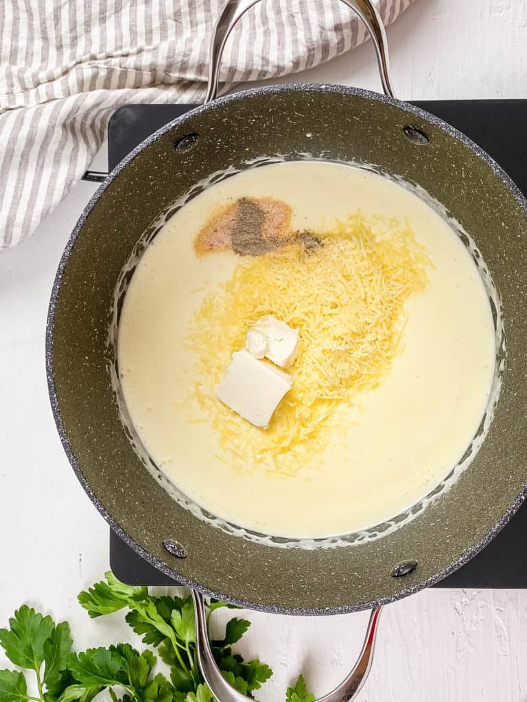 wet and dry ingredients added to pot