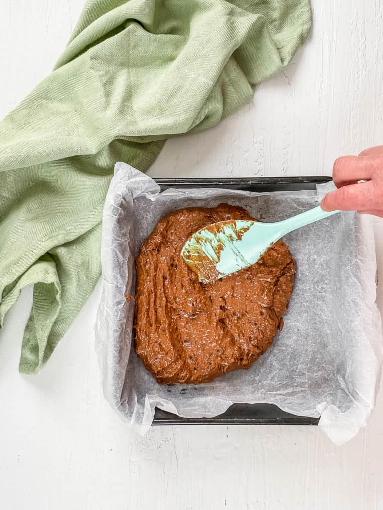 chocolate batter spread in a pan