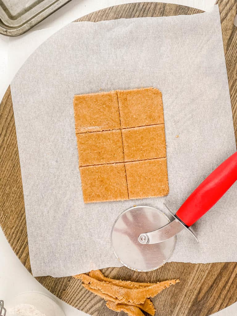 pizza cutter used to cut out vegan graham crackers