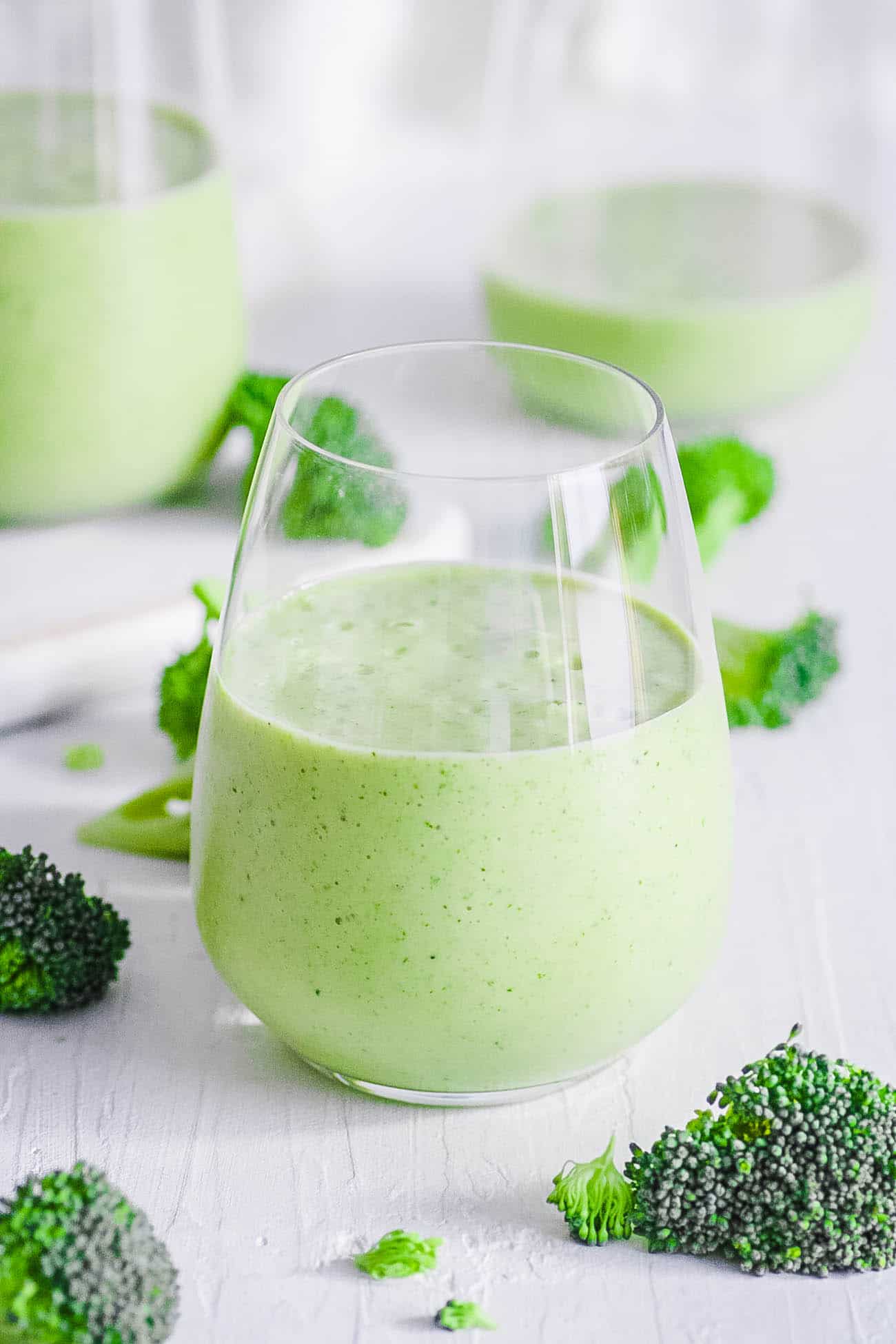 easy healthy vegan gluten free broccoli smoothie recipe with banana in a glass