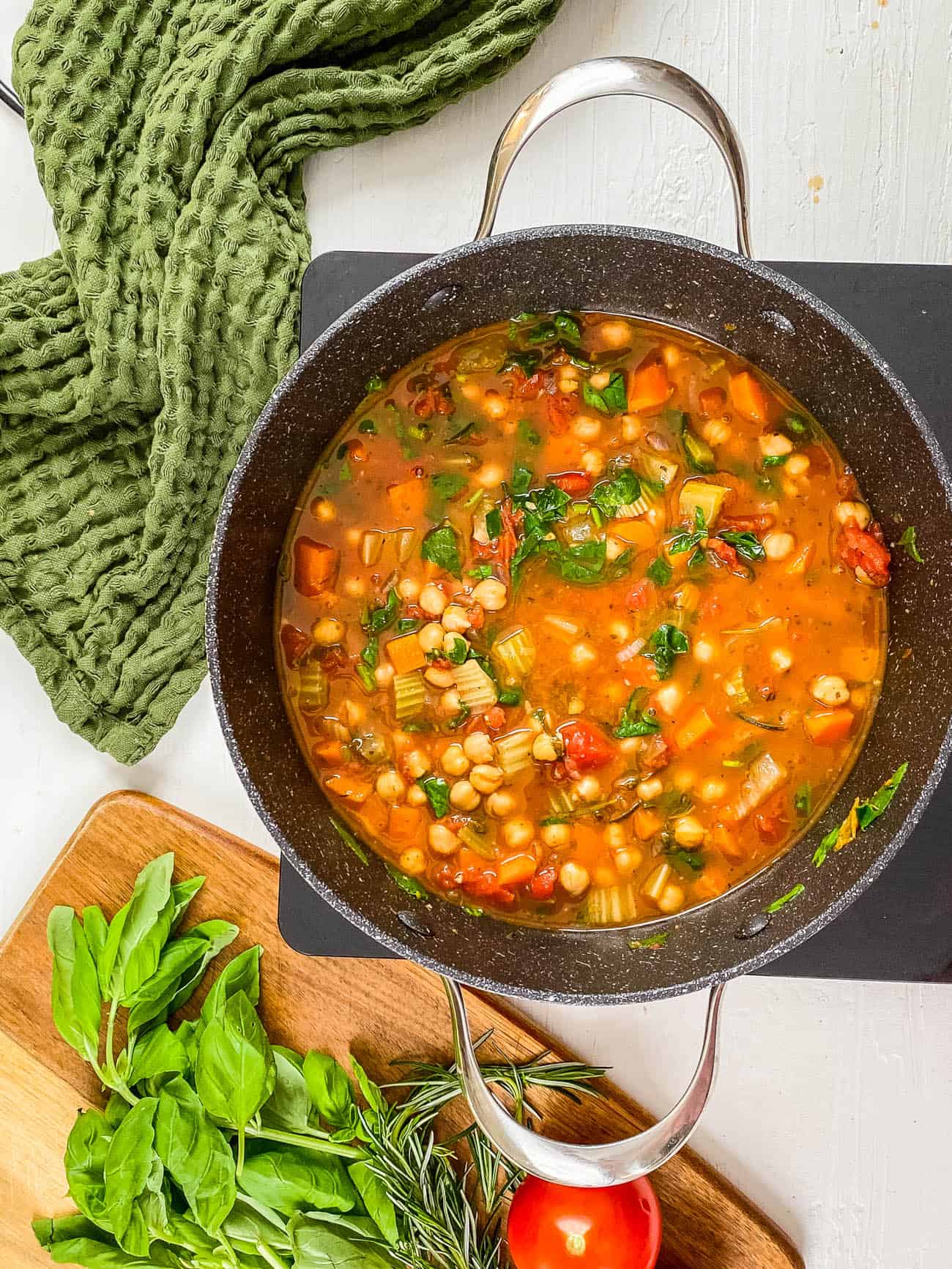 Italian chickpea soup recipe cooking in a pot.