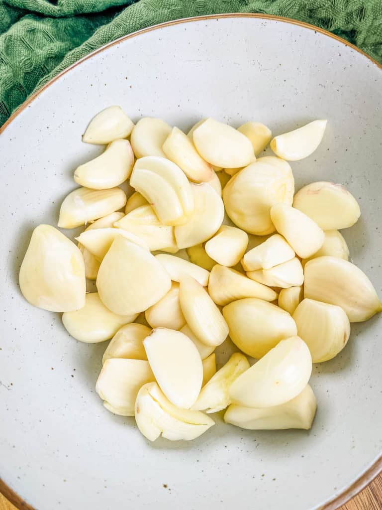 peeled garlic in a bowl