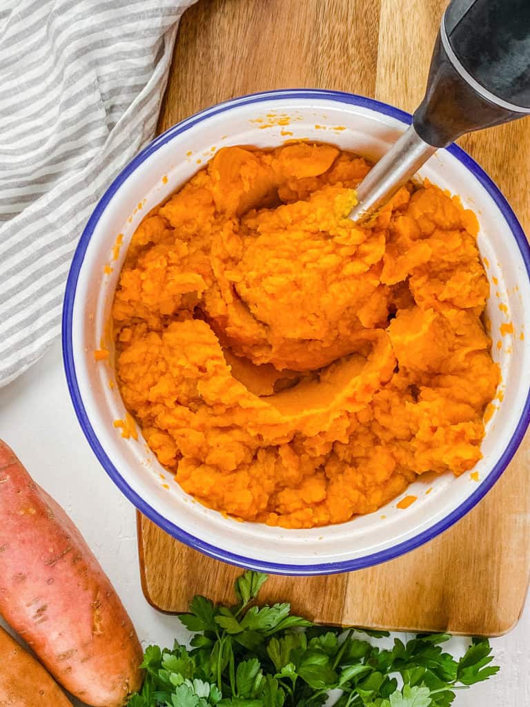 sweet potatoes pureed in a bowl