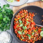 easy healthy pinto bean casserole recipe in a pan - vegetarian and gluten free